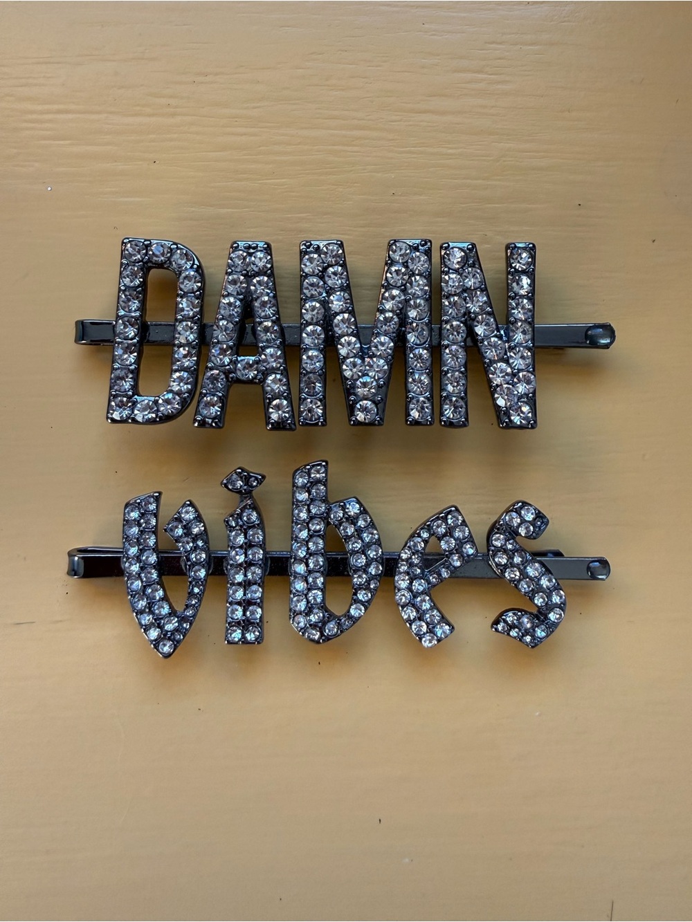Sparkly silver Kitsch x Justine Marjan DAMN and vibes Rhinestone Bobby Pins